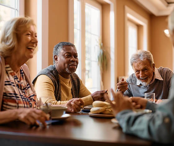 Group of seniors eating food