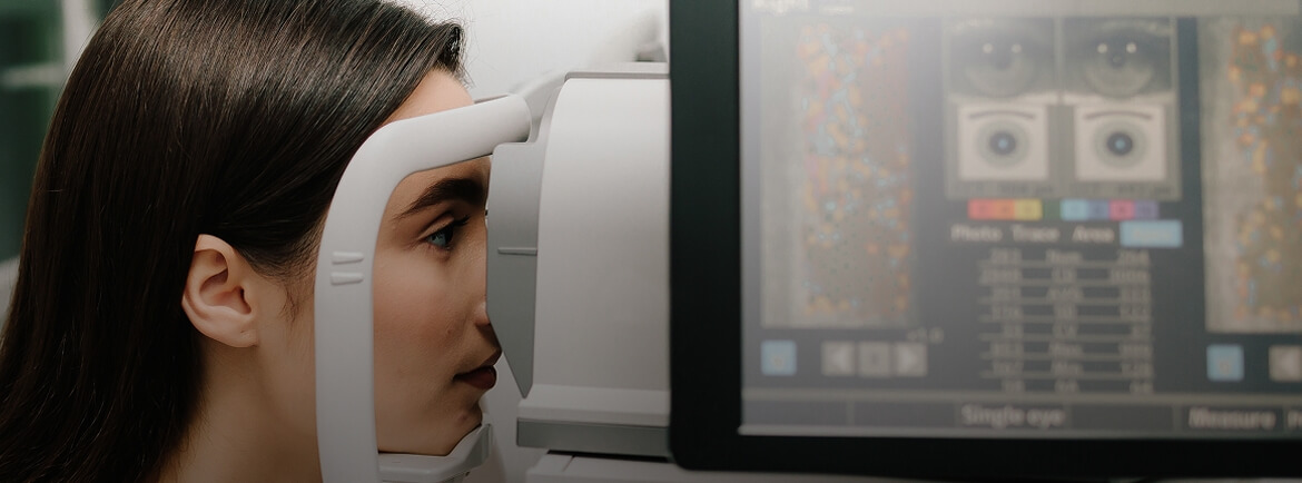 Woman having her eyes checked at Positive Eye Ons Clinic